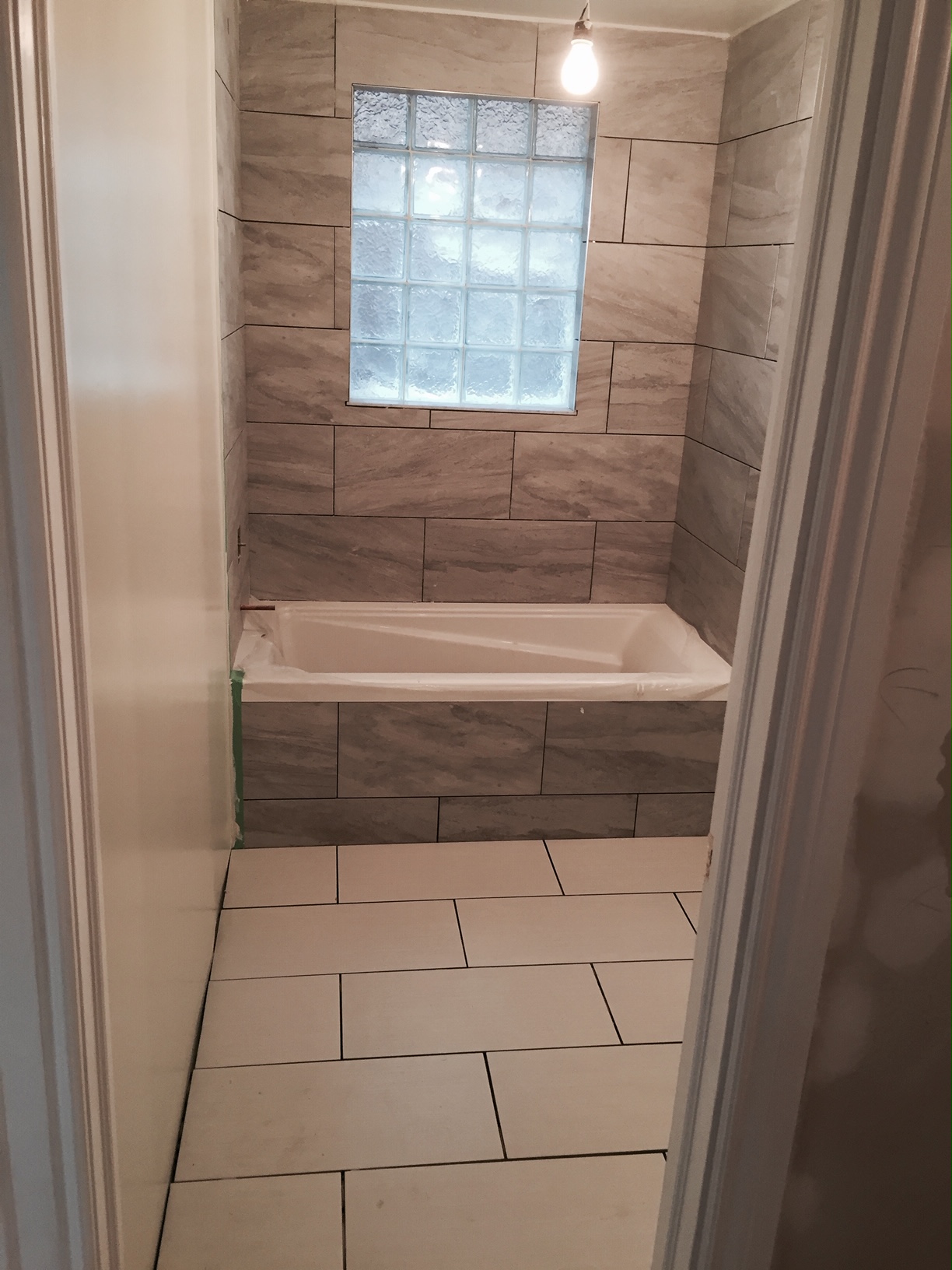 Completed bathtub renovation by Tom Day Plumbing